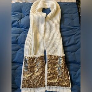 Thick Knit scarf, 76 in. long. Pockets at each side of scarf. Worn once.